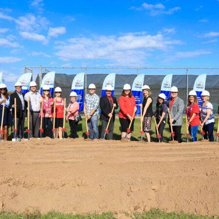 Austin ISD staff break ground at Bowie High School to celebrate the beginning of the construction for the new modernization project.